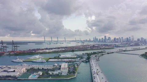 4K drone view on traffic on highway bridge over Miami Bay harbor, Florida, USA Video stock 134441615