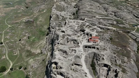 A 4K drone view of Uplistsikhe Cave City in Georgia. Video stock 314213436