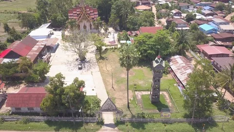 4K Drone view of Wat Si Bun Rueang, wooden bell tower of Thai temple Stock Footage 90680294