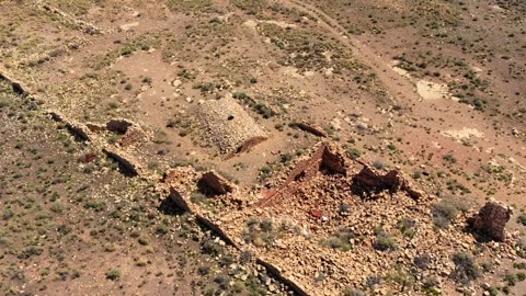 4K Drone Wilderness: Spooky Decaying Brick Ruins Of The Old West Stock Footage 338073424
