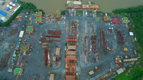 4K : Drones are flying over a large steel plant during cloudy day Stock Footage 210778502