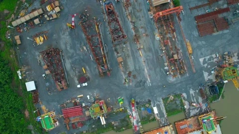 4K : Drones are flying over a large steel plant during cloudy day Stock Footage 210779407