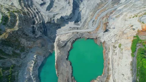 4K : Drones are flying over a large quarry Stock Footage 210782776