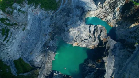 4K : Drones are flying over a large quarry Stock Footage 210786096