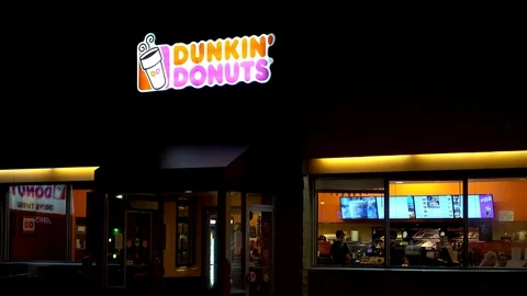 4K Dunkin Donuts coffee shop, late night customers Video stock 70402736