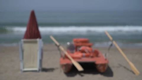 "4K dynamic focus of shore with lifeguard boat" Stock Footage 90843639