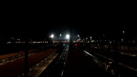 [4k] Dystopic and Futuristic Train Station Lit By Floodlights Video stock 102479246