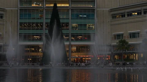 4K Editorial shot of Lake Symphony fountains and Christmas tree at Suria KLCC 스톡 동영상 337086620