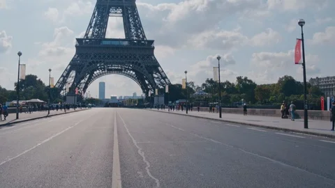 4K Eiffel Tower close up view from road during daytime - Slow Motion Stock Footage 117917551