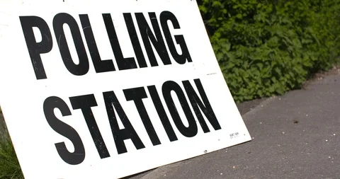 4k Elections: Anonymous voters voting at a polling station tracking shot. Stock Footage 89815552