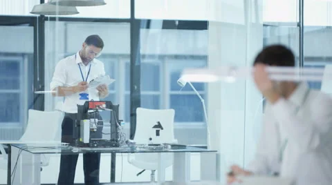 4K Electronic engineering team working in the lab, testing 3D printer &amp; circuit  Stock Footage 67886204