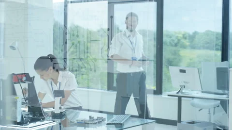 4K Electronic engineering team working in the lab, testing 3D printer &amp; circuits Stock Footage 67994034