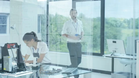 4K Electronic engineering team working in the lab, testing 3D printer &amp; circuits Stock Footage 67995844