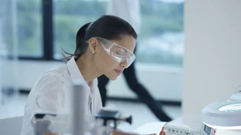 4K Electronic engineers working in the lab, testing 3D printer &amp; circuit boards Stock Footage 68011547