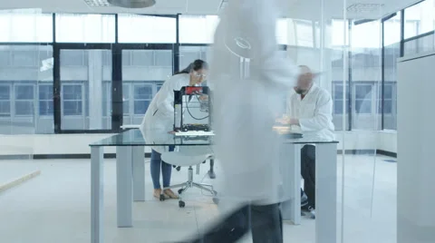 4K Electronics engineering team building &amp; testing robotics &amp; electronics Stock Footage 68058708