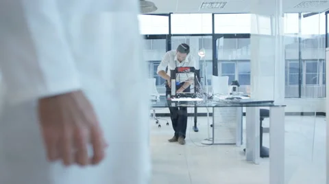 4K Electronics engineering team building &amp; testing robotics &amp; electronics Stock Footage 68060064