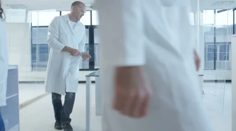 4K Electronics engineering team building &amp; testing robotics &amp; electronics Stock Footage 68145935