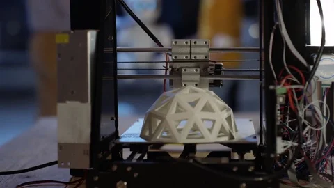 4K Electronics engineering team building robot with 3D printed components Stock Footage 73838820