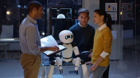 4K Electronics engineering team building robot with 3D printed components Stock Footage 73841146