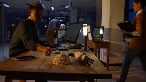 4K Electronics engineers building automated robot using 3D printed components Vídeos de archivo 73852185