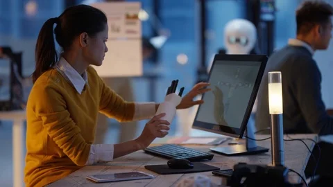 4K Electronics engineers in the lab working on a prototype for automated robot Stock-Footage 73826583