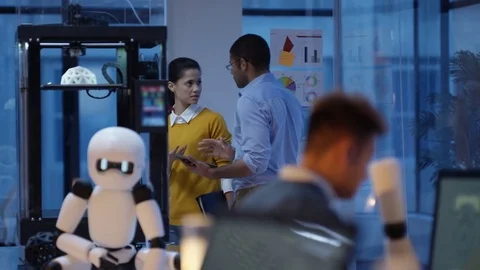 4K Electronics engineers using 3D printed components to create a robot Stock Footage 73831251