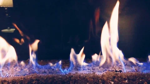 4K Elegant Fireplace Burning With Crystal Stone Stock Footage 116460168