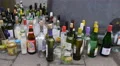 4k Empty bottles and glassware beside glass trash container 4k or 4k+ Resolution