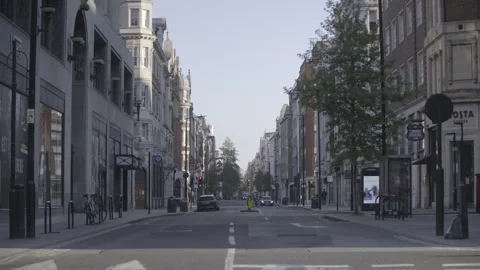 4K EMPTY CENTRAL LONDON STREETS LOCKDOWN / OXFORD CIRCUS / OXFORD STREET / SUNNY Stock Footage 286215717
