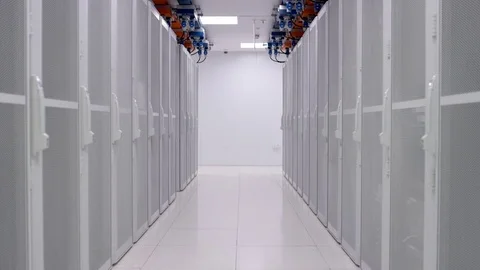 4K Empty interior of large modern data centre with rows of server racks Stock Footage 75025206