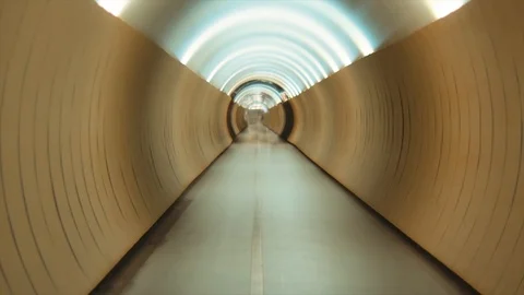 4K Empty yellow tunnel, walk way with beautiful perspective.  Stock Footage 97013302