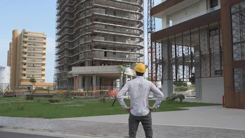 4K engineer and worker on building site Stock Footage 92296740