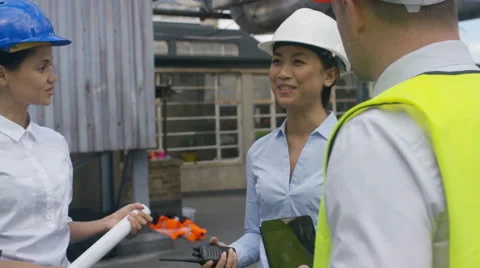 4K Engineering team having a meeting at urban industrial site Stock Footage 67481952