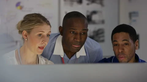 4K Engineering team working together, looking at computer screen 스톡 동영상 63315673