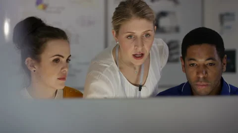 4K Engineering team working together, looking at computer screen 스톡 동영상 63317630