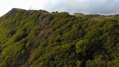 4k Epic cinematic drone shot of lush green mountain valley in Wales, UK.  Video stock 126853577