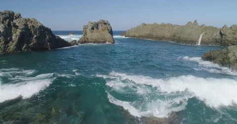 4k Epic drone shot of powerful ocean waves crashing rocks in Tenerife Stock Footage 84194204