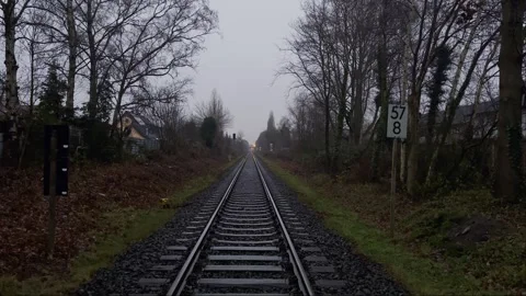 4K Epic View of Train Tracks Stretching on a Rainy Winter Day Stock Footage 245416382