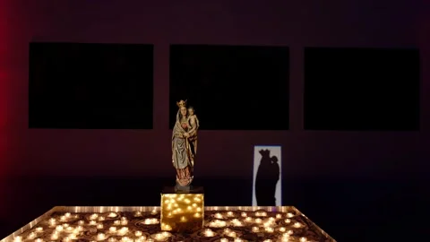 4K Epic View of Virgin Mary and Baby Jesus Statue with Lighting in a Church Stock Footage 263841507