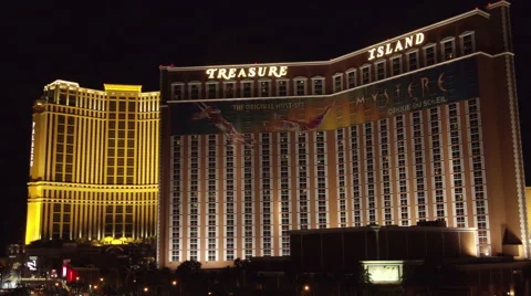 4K ES: Las Vegas Skyline Features Treasure Island &amp; Palazzo Hotel Casinos Stock Footage 64567006