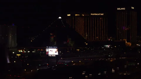 4K ES: Traffic Flows Along I-15 Through the Heart of Las Vegas Stock Footage 64561054