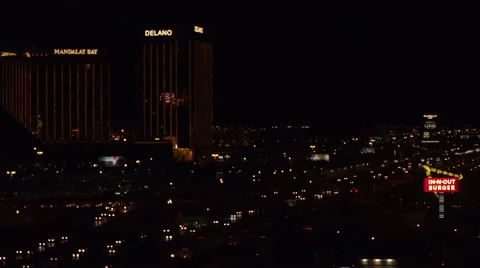 4K ES: Traffic Flows Along I-15 Through the Heart of Las Vegas Stock Footage 64561060