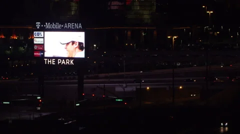 4K ES: Traffic Flows Along I-15 Through the Heart of Las Vegas Stock Footage 64561271
