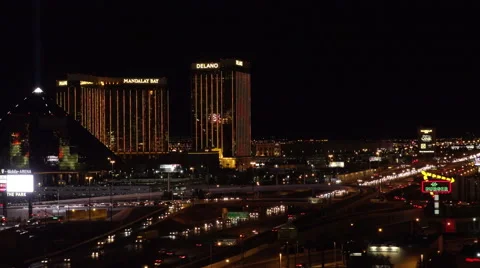 4K ES: Traffic Flows Along I-15 Through the Heart of Las Vegas Stock Footage 64564590