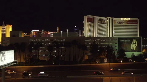4K ES: Traffic Flows Along I-15 Through the Heart of Las Vegas Stock Footage 64567374