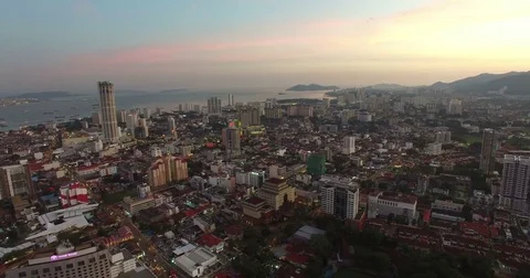 4k evening aerial backsweep of georgetown penang Stock Footage 71358074