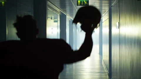 4K Excited American football team celebrate a victory as they run through tunnel Stock Footage