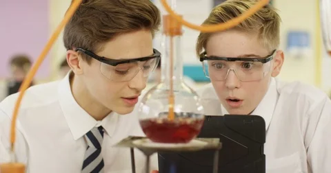 4k, Excited high school students doing science experiment in school laboratory.  Stock Footage 73157002