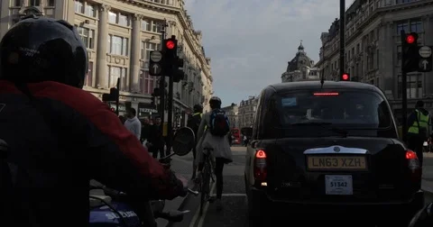 4K EXT DAY handheld static London crossroad with a traffic lights Stock Footage 72307424