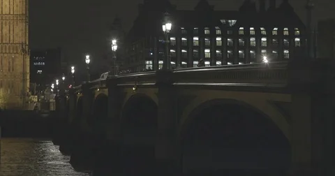 4K EXT NIGHT static bridge over a river with a going double-decker Stock Footage 72305458